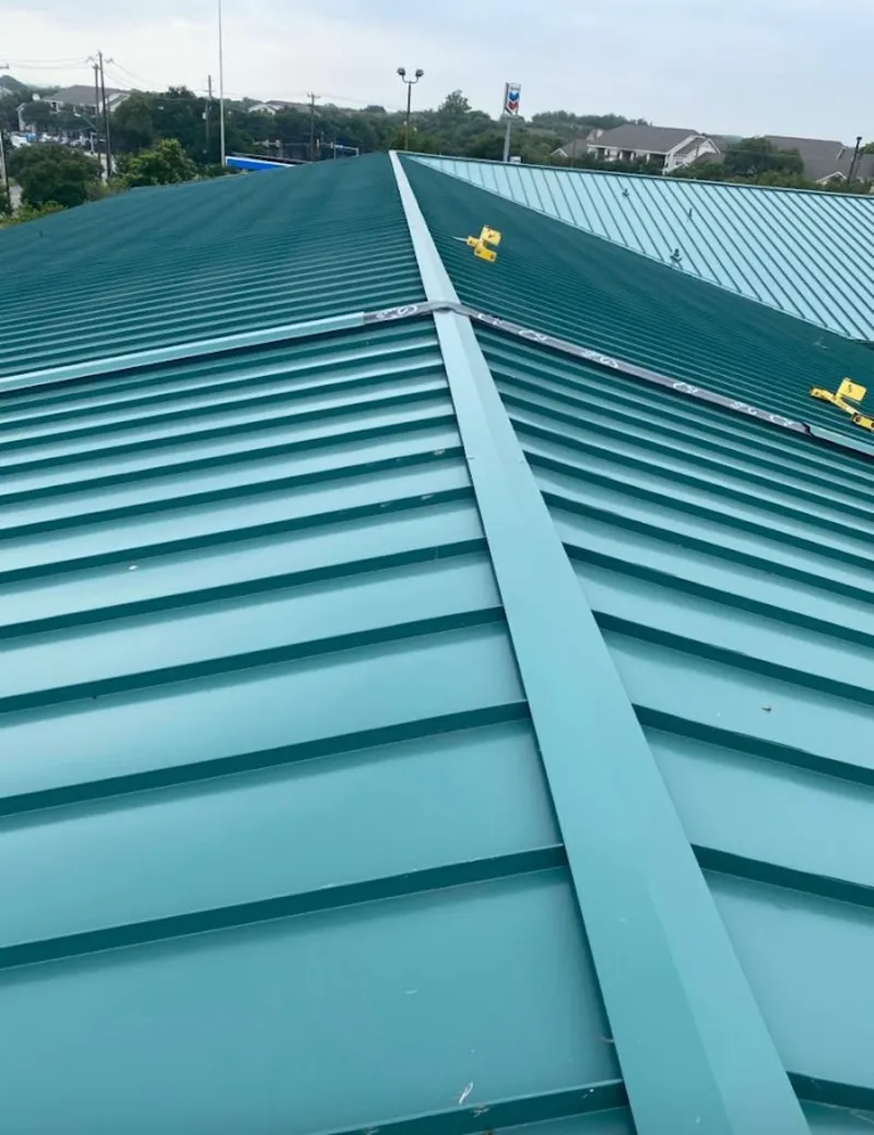 Green commercial metal roof ridge and valley for Metal Roof Repair in Eastlake